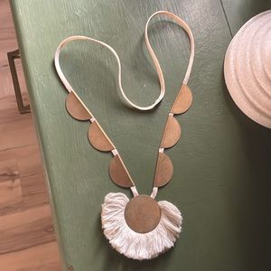 Free People long necklace brass looking w/ cream tassel